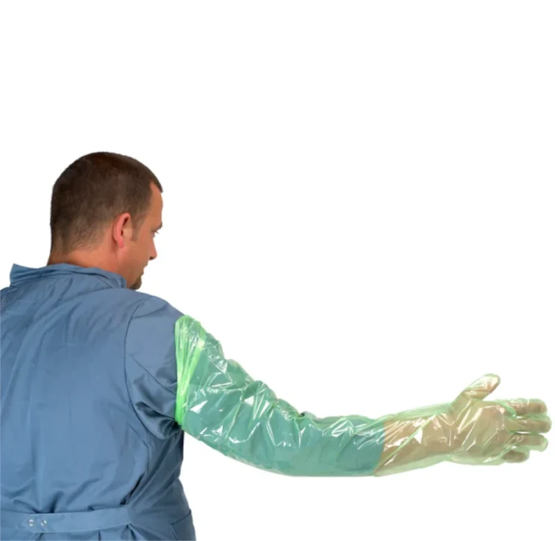 Man showing size of arm length gloves